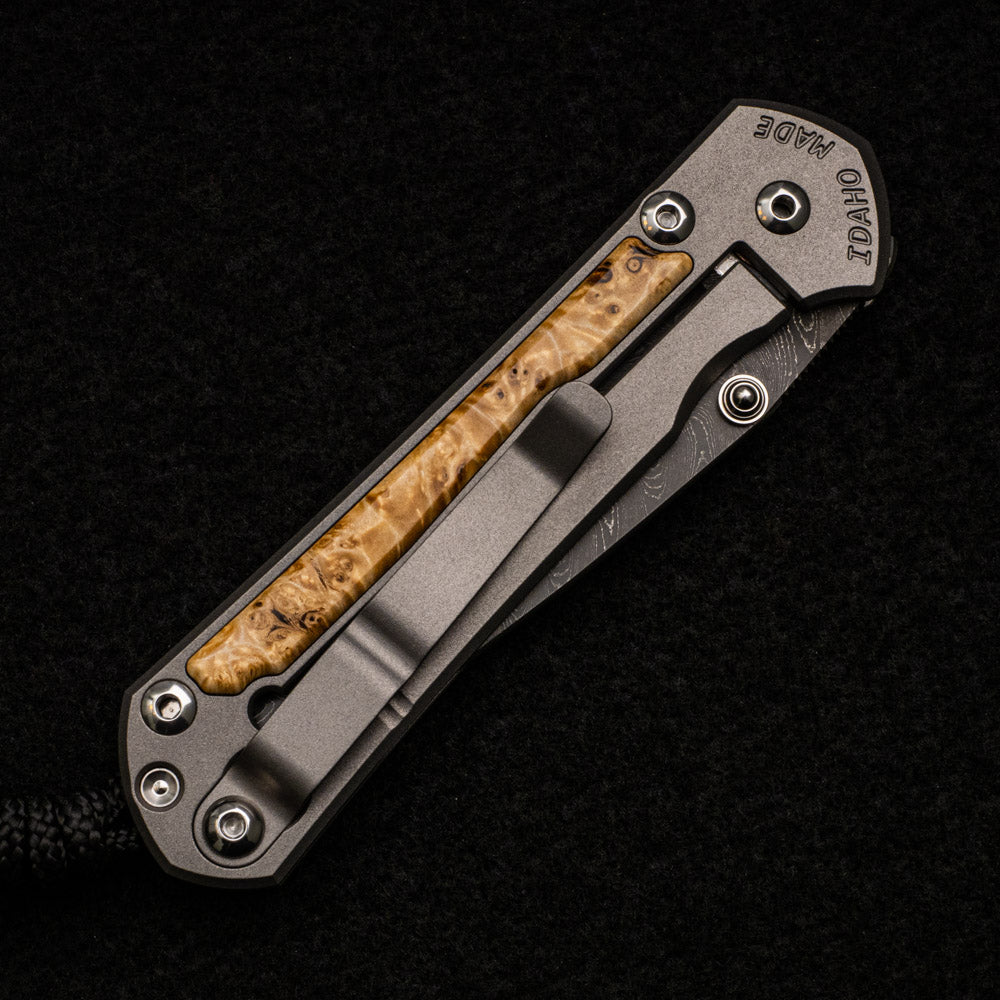 CHRIS REEVE SMALL SEBENZA 31 BOX ELDER BURL INLAY - BOOMERANG BLADE - SILVER DOUBLE THUMB LUGS