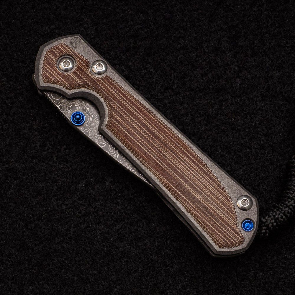 CHRIS REEVE SMALL SEBENZA 31 NATURAL CANVAS MICARTA INLAY - RAINDROP BLADE - BLUE DOUBLE THUMB LUGS