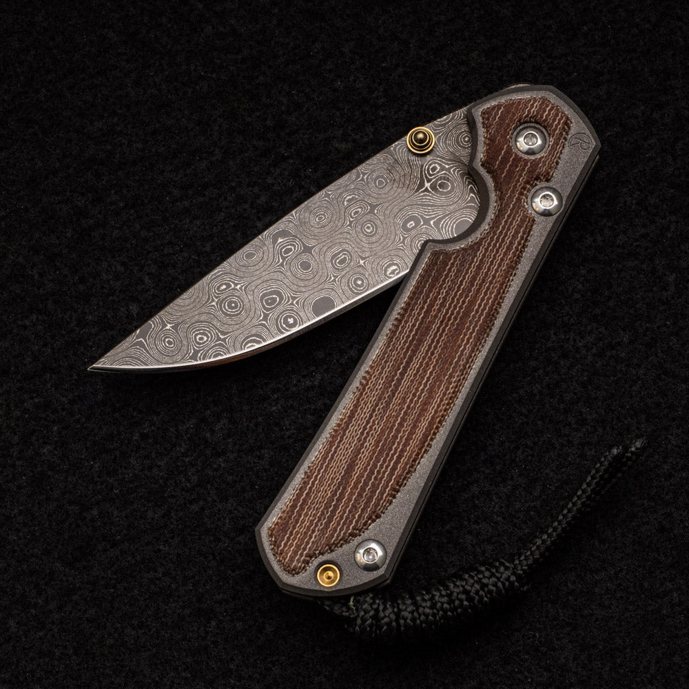 CHRIS REEVE SMALL SEBENZA 31 NATURAL CANVAS MICARTA INLAY - RAINDROP BLADE - GOLD DOUBLE THUMB LUGS