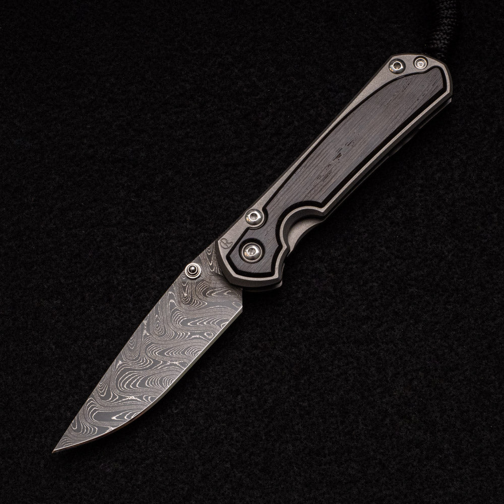 CHRIS REEVE SMALL SEBENZA 31 BOG OAK INLAY - BOOMERANG BLADE - SILVER DOUBLE THUMB LUGS