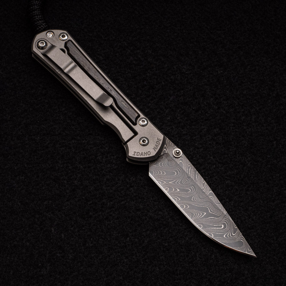 CHRIS REEVE SMALL SEBENZA 31 BOG OAK INLAY - BOOMERANG BLADE - SILVER DOUBLE THUMB LUGS