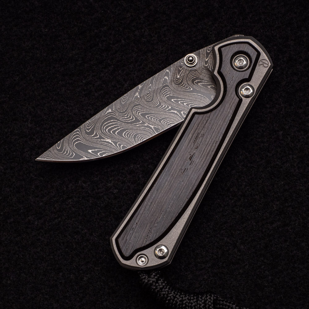 CHRIS REEVE SMALL SEBENZA 31 BOG OAK INLAY - BOOMERANG BLADE - SILVER DOUBLE THUMB LUGS