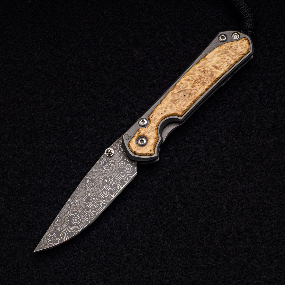 CHRIS REEVE SMALL SEBENZA 31 BOX ELDER - RAINDROP BLADE - SILVER DOUBLE THUMB LUGS