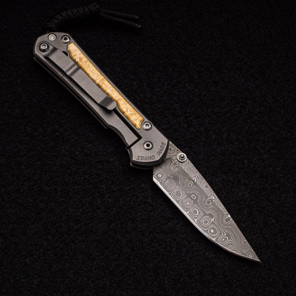 CHRIS REEVE SMALL SEBENZA 31 BOX ELDER - RAINDROP BLADE - SILVER DOUBLE THUMB LUGS