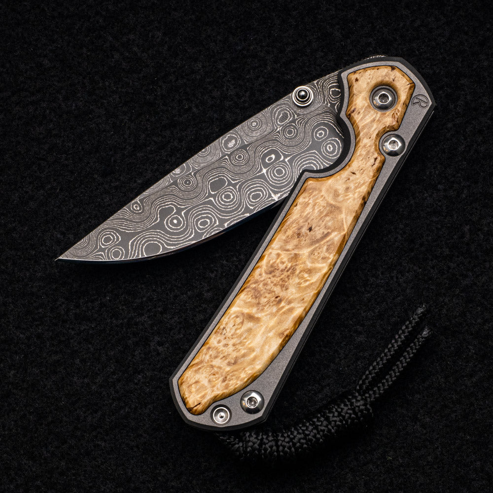 CHRIS REEVE SMALL SEBENZA 31 BOX ELDER - RAINDROP BLADE - SILVER DOUBLE THUMB LUGS