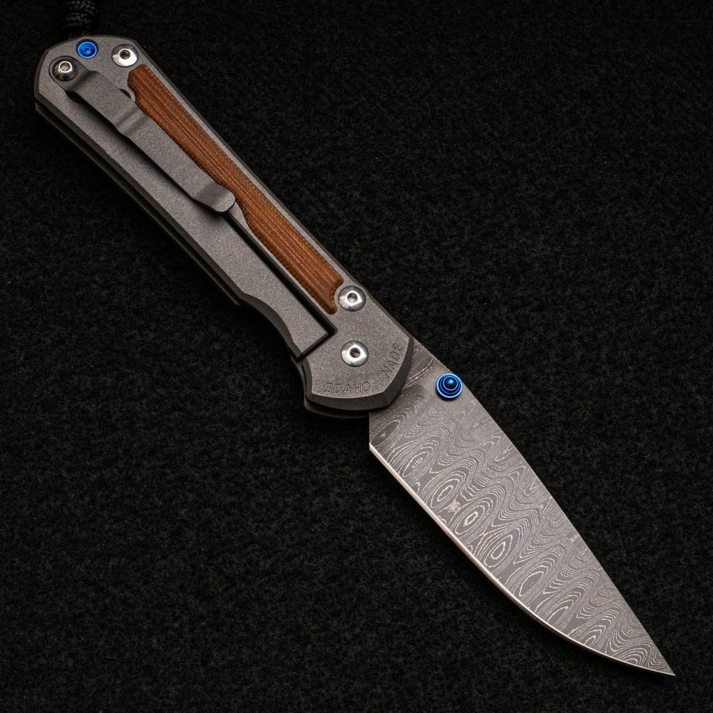 CHRIS REEVE LARGE SEBENZA 31 NATURAL CANVAS MICARTA INLAY - LADDER BLADE - BLUE DOUBLE THUMB LUGS