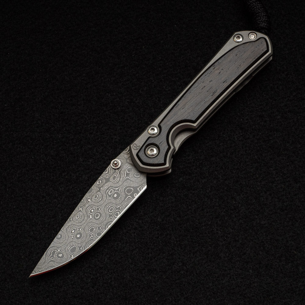 CHRIS REEVE SMALL SEBENZA 31 BOG OAK INLAY - RAINDROP BLADE - SILVER DOUBLE THUMB LUGS