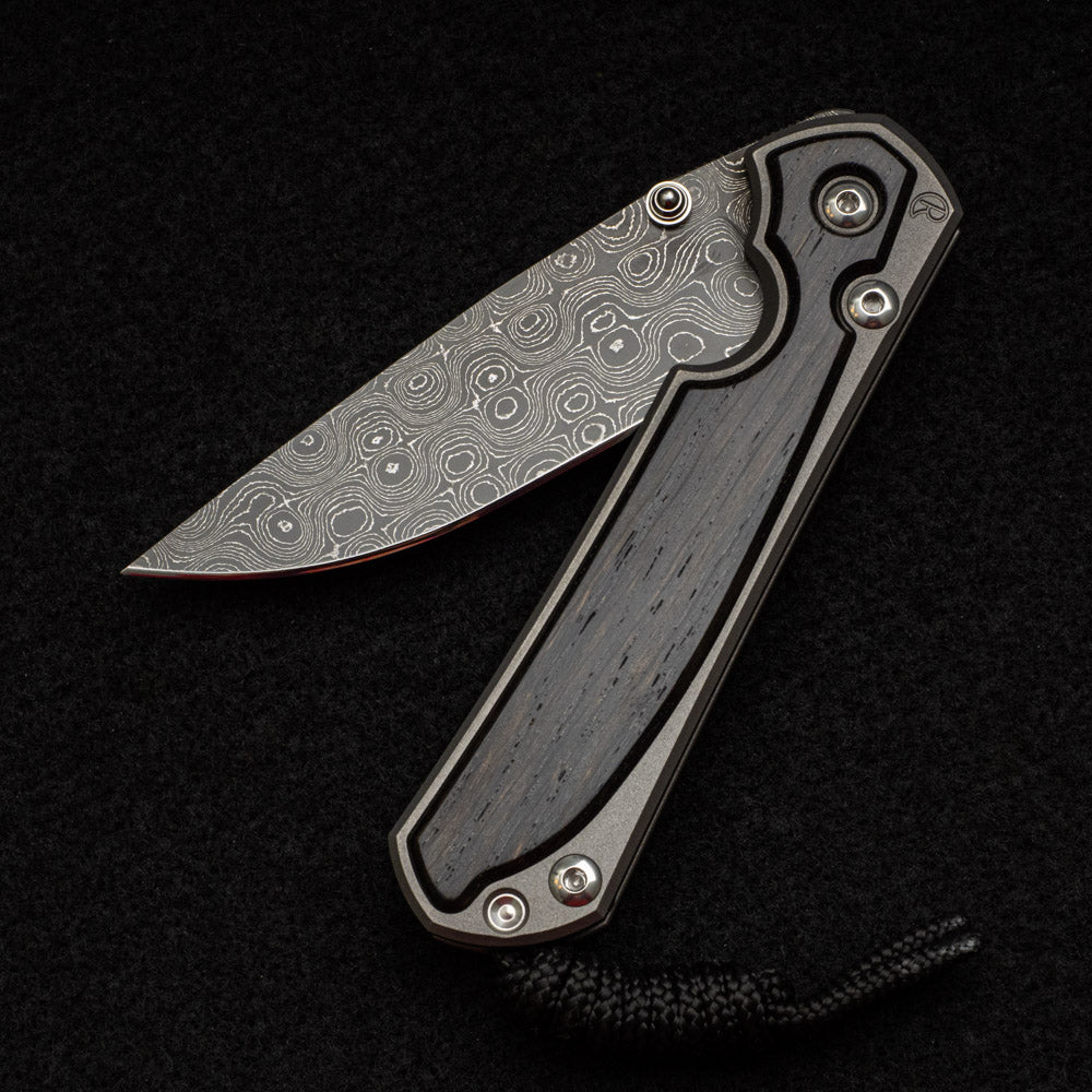 CHRIS REEVE SMALL SEBENZA 31 BOG OAK INLAY - RAINDROP BLADE - SILVER DOUBLE THUMB LUGS