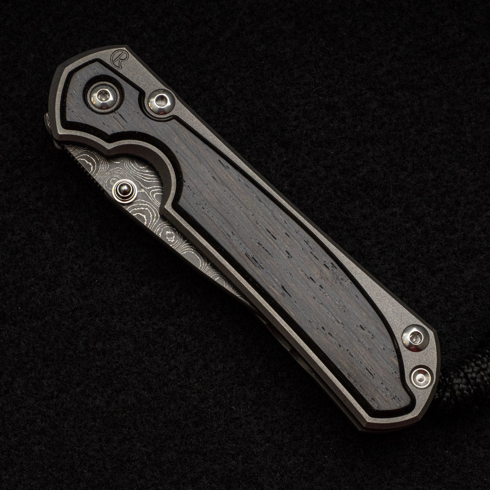 CHRIS REEVE SMALL SEBENZA 31 BOG OAK INLAY - RAINDROP BLADE - SILVER DOUBLE THUMB LUGS