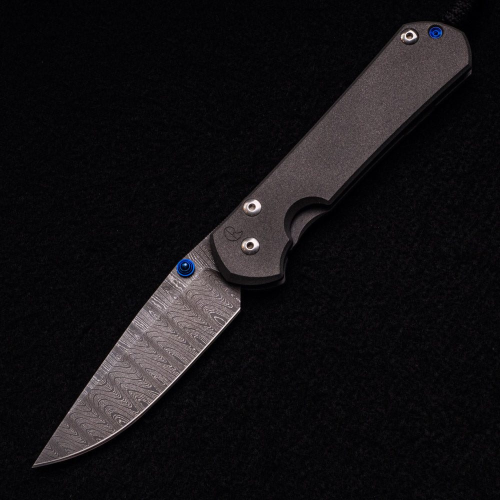 CHRIS REEVE LARGE SEBENZA 31 – BLUE THUMB LUGS – LADDER BLADE