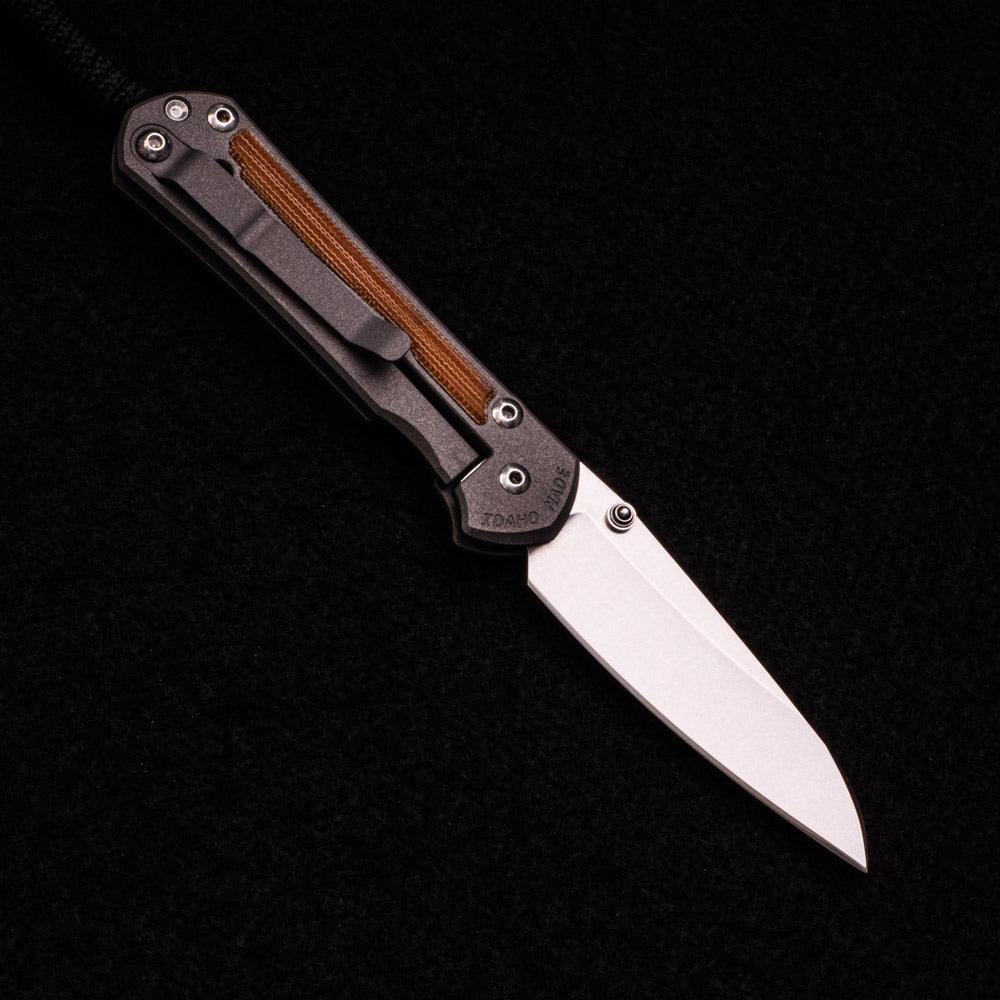 CHRIS REEVE SMALL SEBENZA 31 NATURAL CANVAS MICARTA INLAY – CPM MAGNACUT INSINGO BLADE – SILVER DOUBLE THUMB LUGS