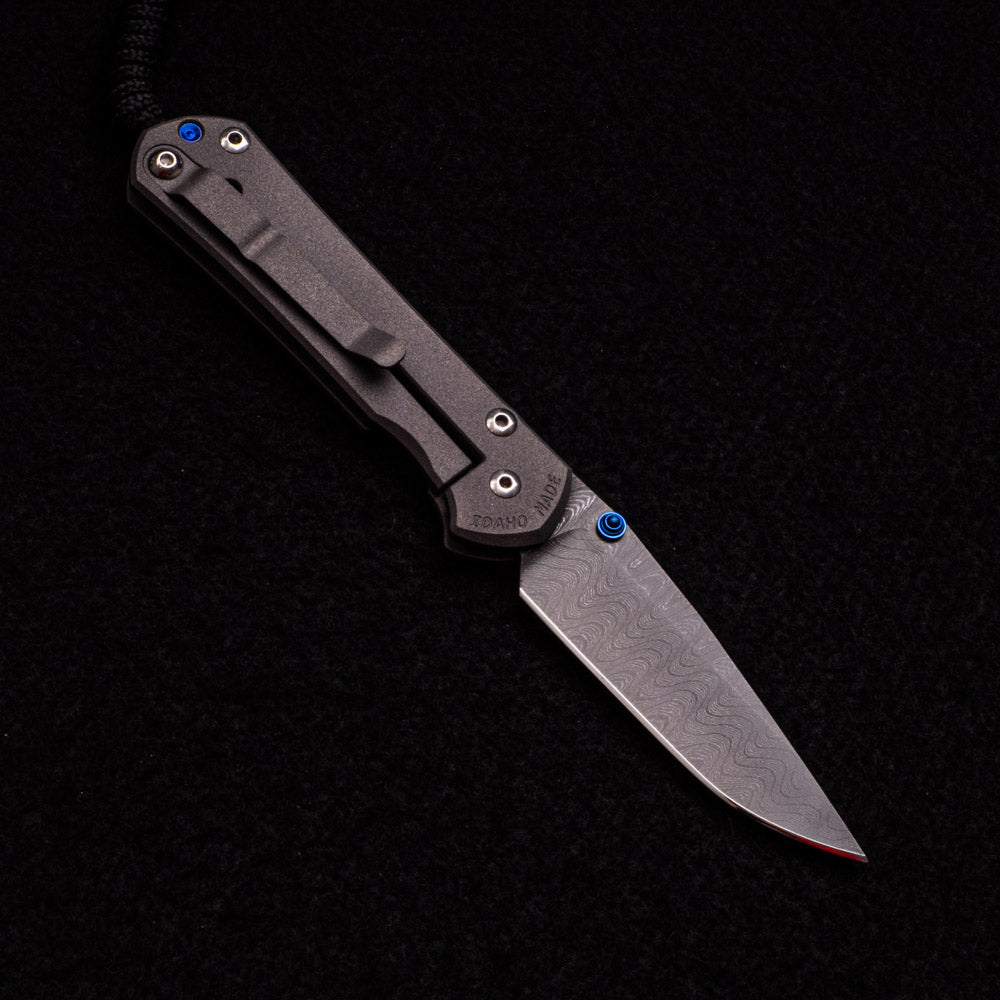 CHRIS REEVE SMALL SEBENZA 31 – LADDER BLADE – BLUE DOUBLE THUMB LUGS