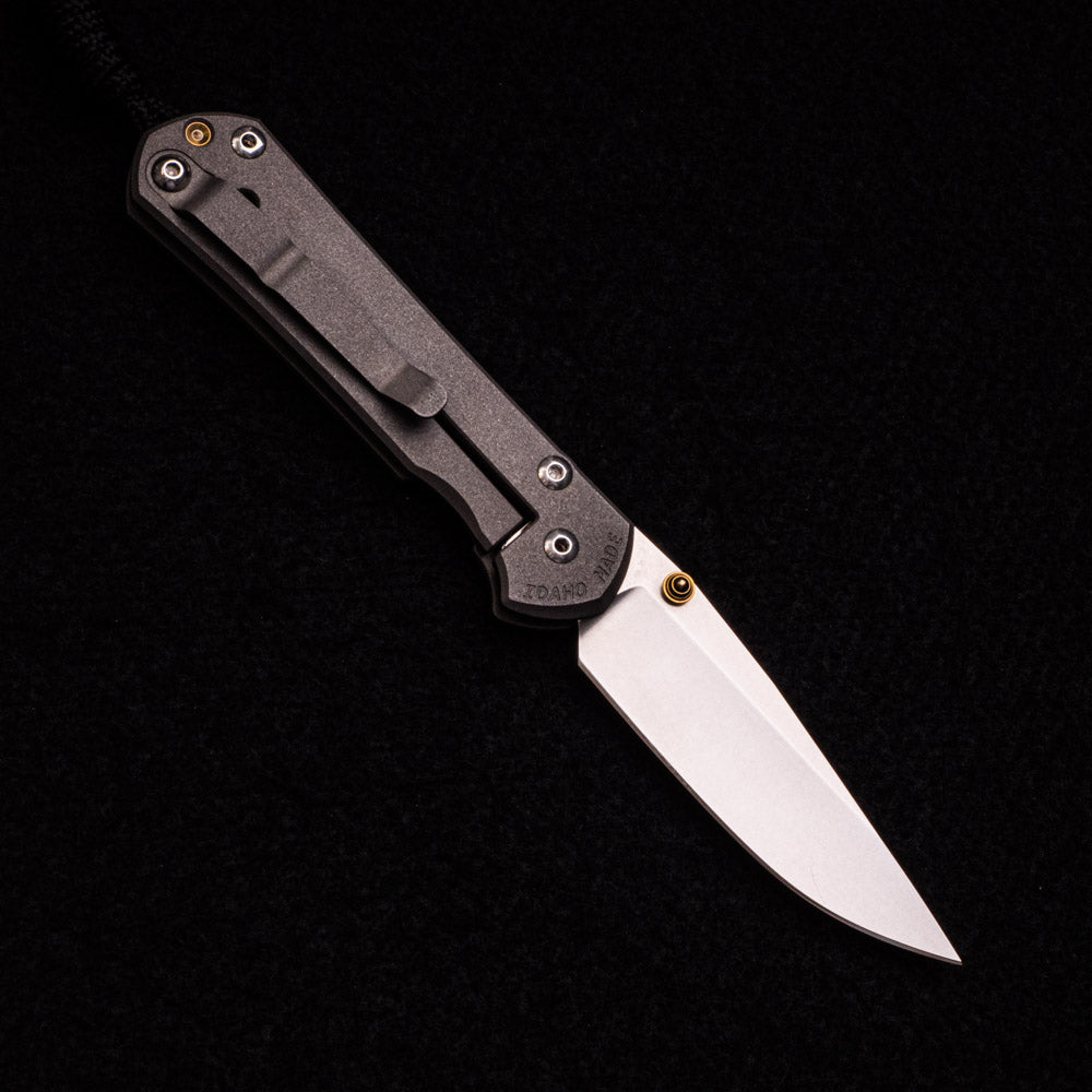 CHRIS REEVE SMALL SEBENZA 31 – GOLD DOUBLE THUMB LUGS – CPM S35VN BLADE