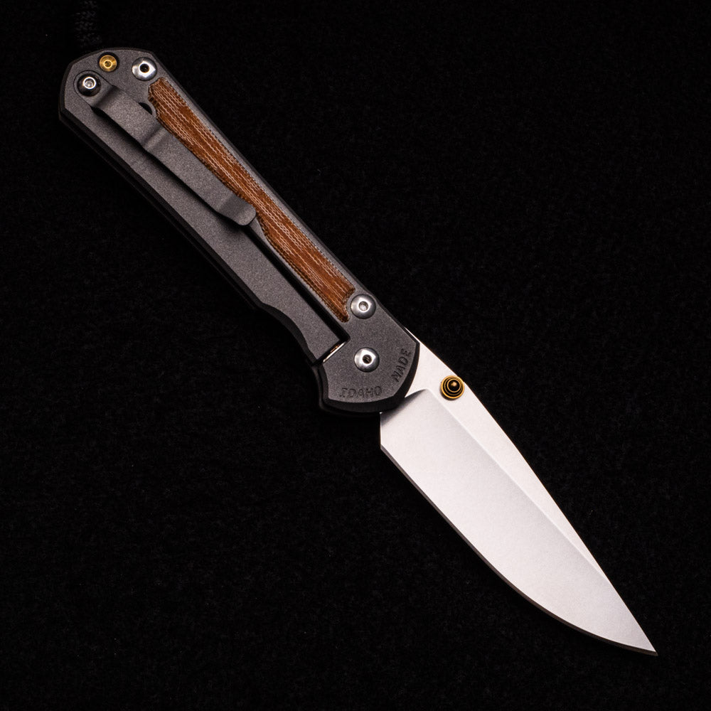 CHRIS REEVE LARGE SEBENZA 31 NATURAL CANVAS MICARTA INLAY – CPM MAGNACUT BLADE – GOLD DOUBLE THUMB LUGS