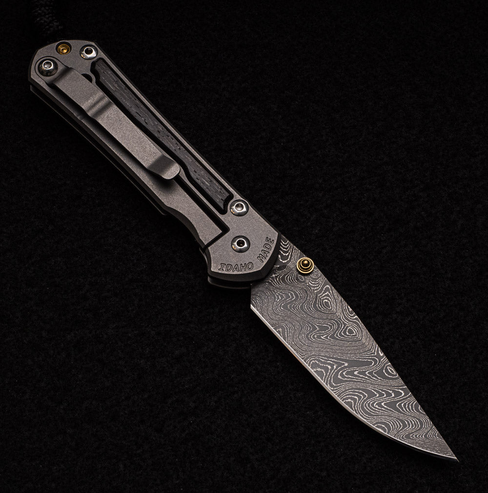 CHRIS REEVE SMALL SEBENZA 31 BOG OAK INLAY - BOOMERANG BLADE - GOLD DOUBLE THUMB LUGS