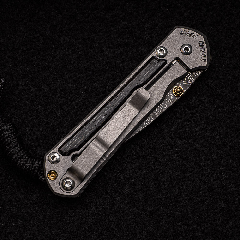 CHRIS REEVE SMALL SEBENZA 31 BOG OAK INLAY - BOOMERANG BLADE - GOLD DOUBLE THUMB LUGS