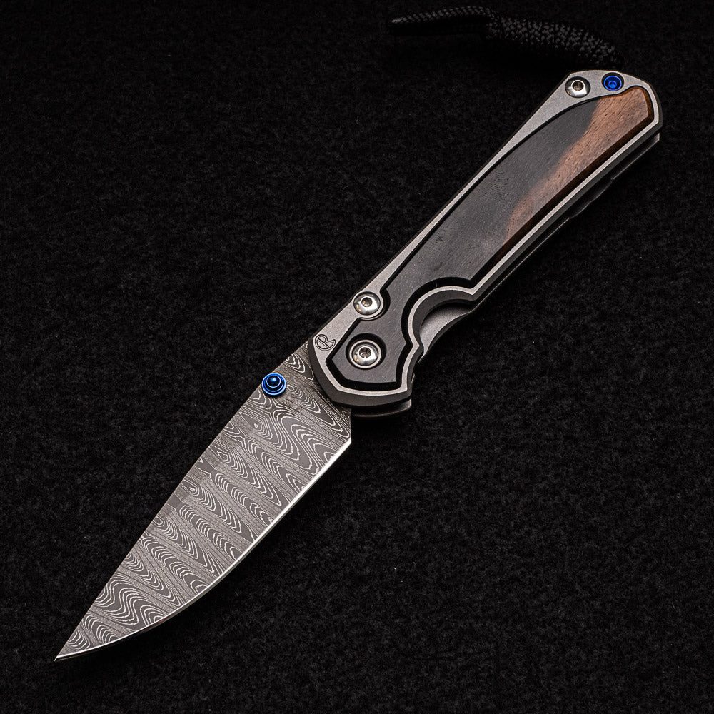 CHRIS REEVE SMALL SEBENZA 31 MACASSAR EBONY - LADDER BLADE - BLUE DOUBLE THUMB LUGS