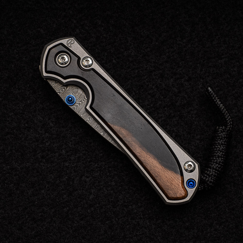 CHRIS REEVE SMALL SEBENZA 31 MACASSAR EBONY - LADDER BLADE - BLUE DOUBLE THUMB LUGS