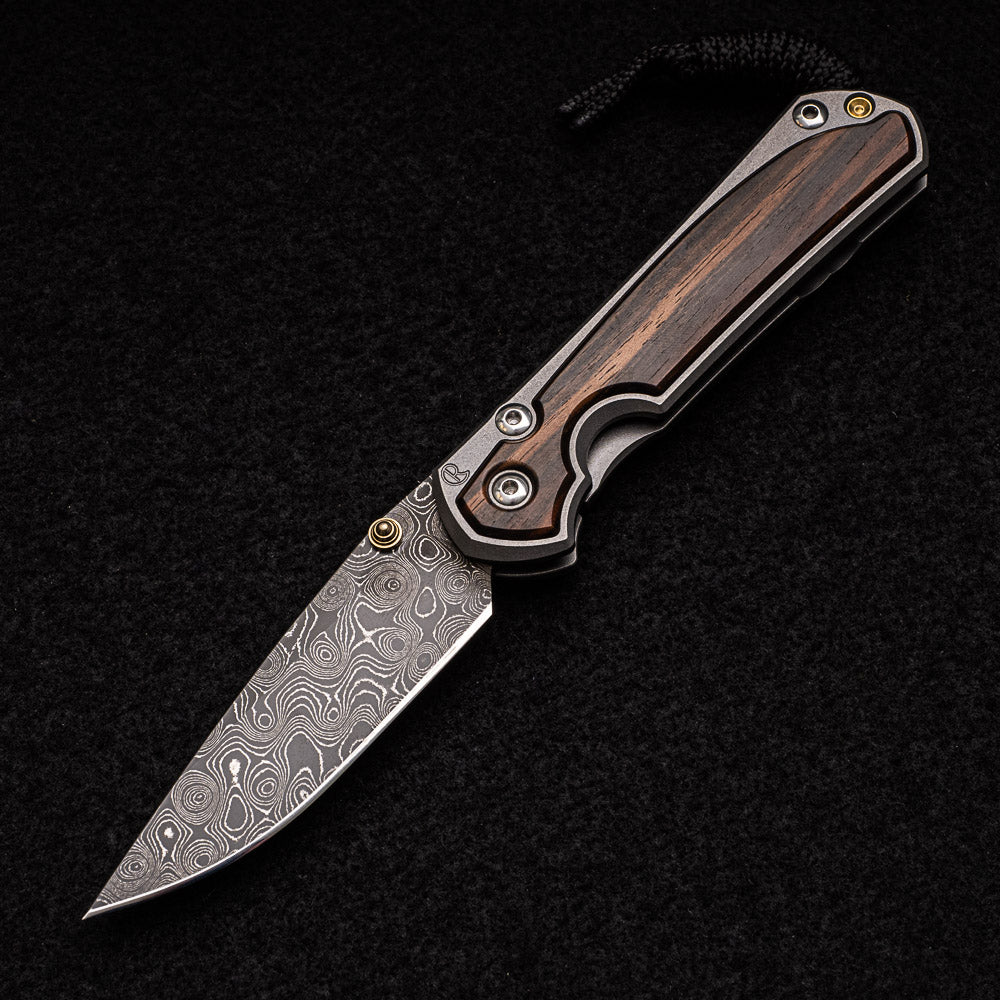 CHRIS REEVE SMALL SEBENZA 31 MACASSAR EBONY - RAINDROP BLADE - GOLD DOUBLE THUMB LUGS