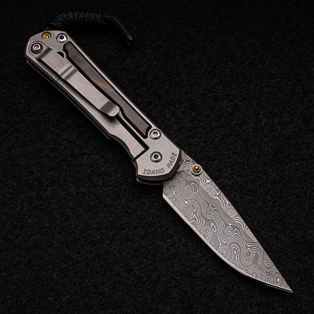 CHRIS REEVE SMALL SEBENZA 31 MACASSAR EBONY - RAINDROP BLADE - GOLD DOUBLE THUMB LUGS