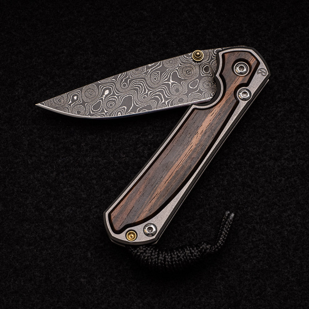 CHRIS REEVE SMALL SEBENZA 31 MACASSAR EBONY - RAINDROP BLADE - GOLD DOUBLE THUMB LUGS