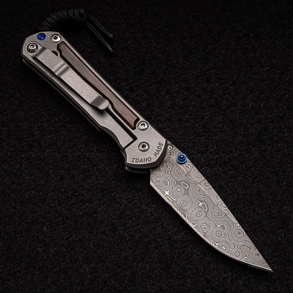 CHRIS REEVE SMALL SEBENZA 31 MACASSAR EBONY - RAINDROP BLADE - BLUE DOUBLE THUMB LUGS