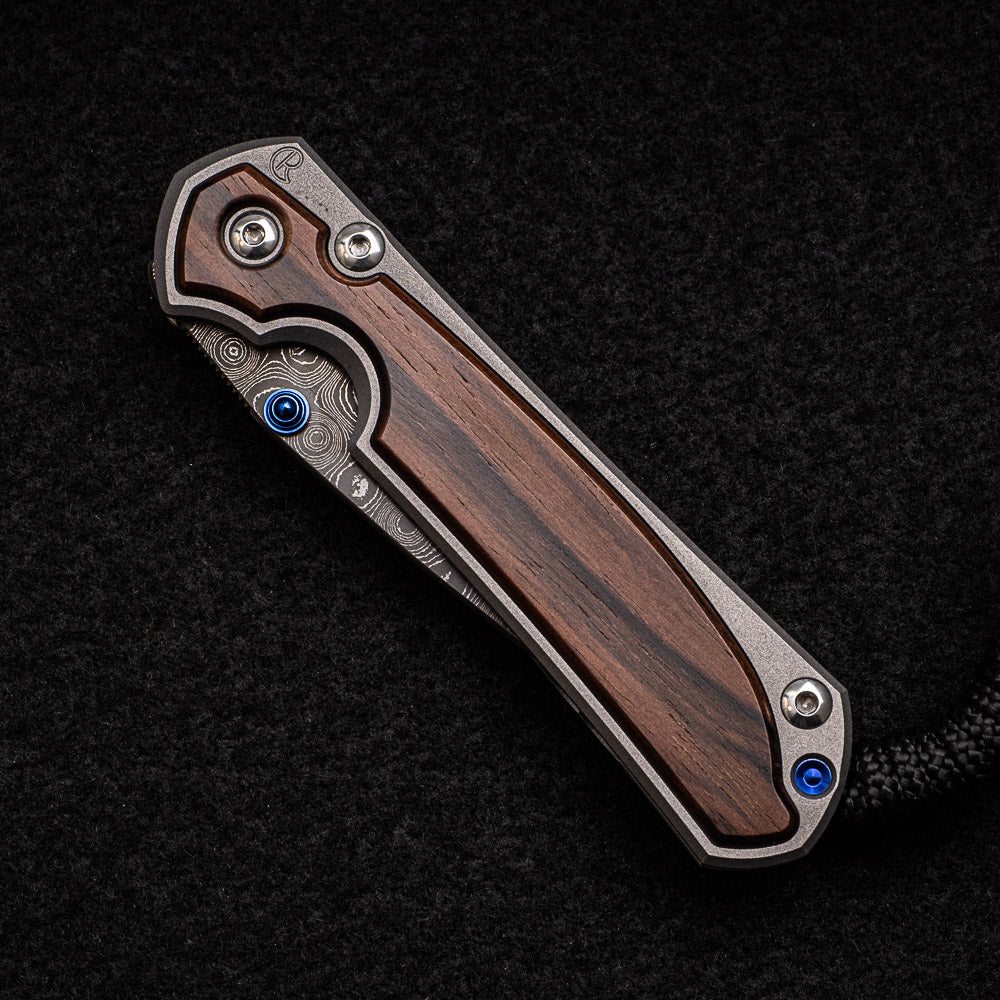 CHRIS REEVE SMALL SEBENZA 31 MACASSAR EBONY - RAINDROP BLADE - BLUE DOUBLE THUMB LUGS