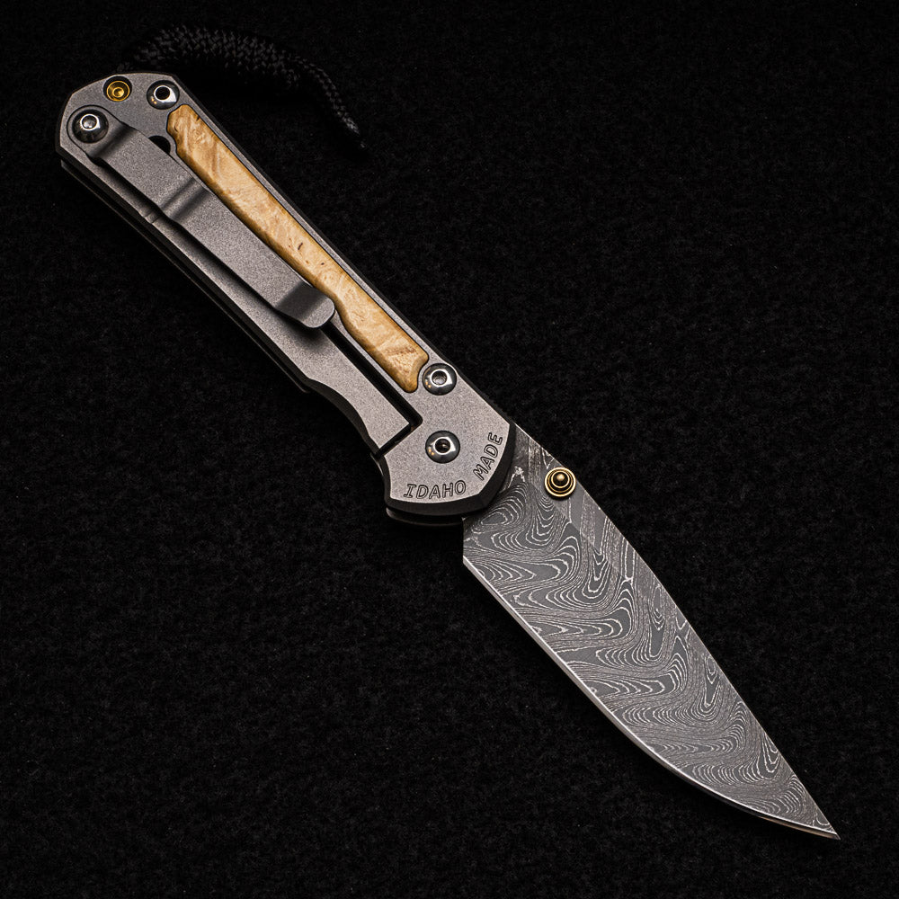 CHRIS REEVE SMALL SEBENZA 31 BOX ELDER INLAY - BOOMERANG BLADE - GOLD DOUBLE THUMB LUGS