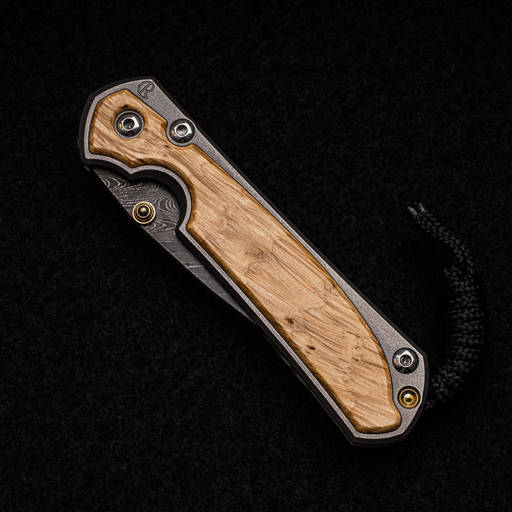 CHRIS REEVE SMALL SEBENZA 31 BOX ELDER INLAY - BOOMERANG BLADE - GOLD DOUBLE THUMB LUGS