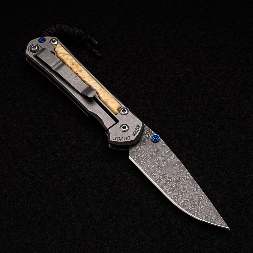 CHRIS REEVE SMALL SEBENZA 31 BOX ELDER INLAY - LADDER BLADE - BLUE DOUBLE THUMB LUGS