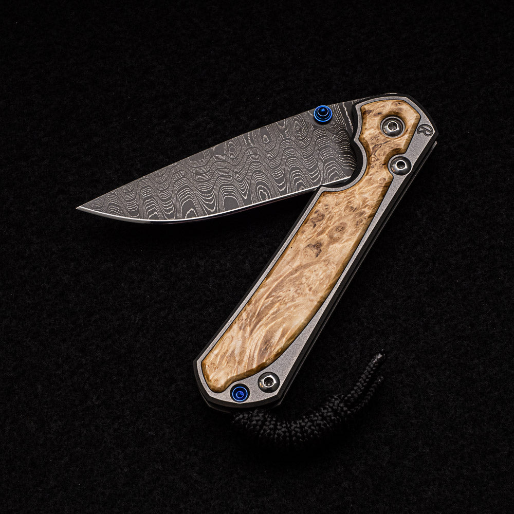 CHRIS REEVE SMALL SEBENZA 31 BOX ELDER INLAY - LADDER BLADE - BLUE DOUBLE THUMB LUGS