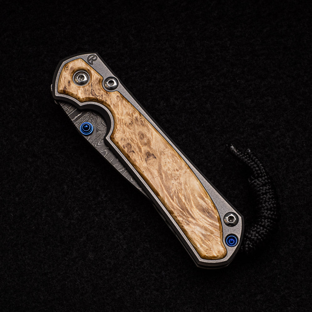 CHRIS REEVE SMALL SEBENZA 31 BOX ELDER INLAY - LADDER BLADE - BLUE DOUBLE THUMB LUGS