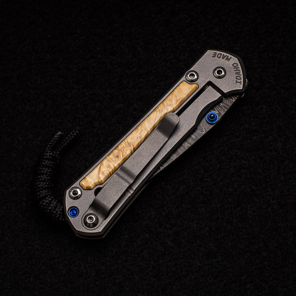 CHRIS REEVE SMALL SEBENZA 31 BOX ELDER INLAY - LADDER BLADE - BLUE DOUBLE THUMB LUGS