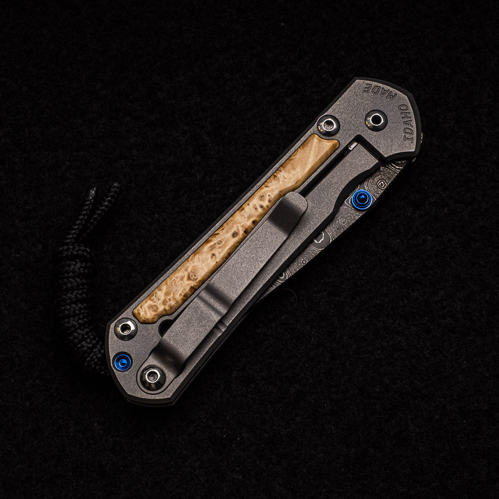 CHRIS REEVE SMALL SEBENZA 31 BOX ELDER - RAINDROP BLADE - BLUE DOUBLE THUMB LUGS