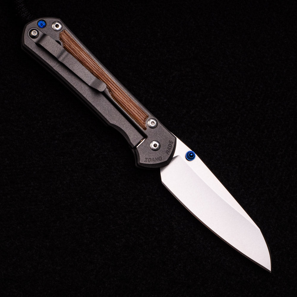 CHRIS REEVE LARGE SEBENZA 31 NATURAL CANVAS MICARTA INLAY – INSINGO CPM MAGNACUT BLADE – BLUE DOUBLE THUMB LUGS