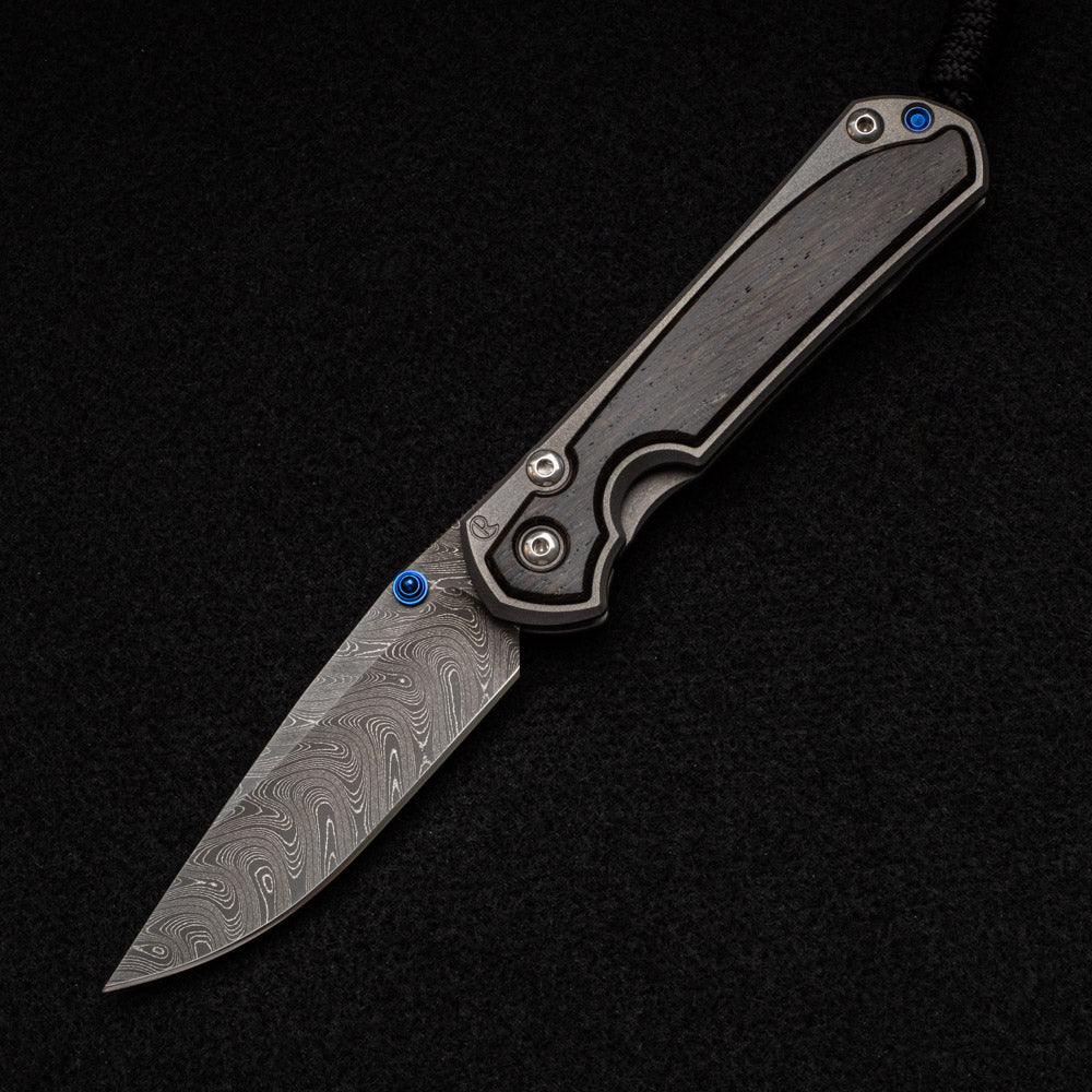 CHRIS REEVE SMALL SEBENZA 31 BOG OAK INLAY - BOOMERANG BLADE - BLUE DOUBLE THUMB LUGS