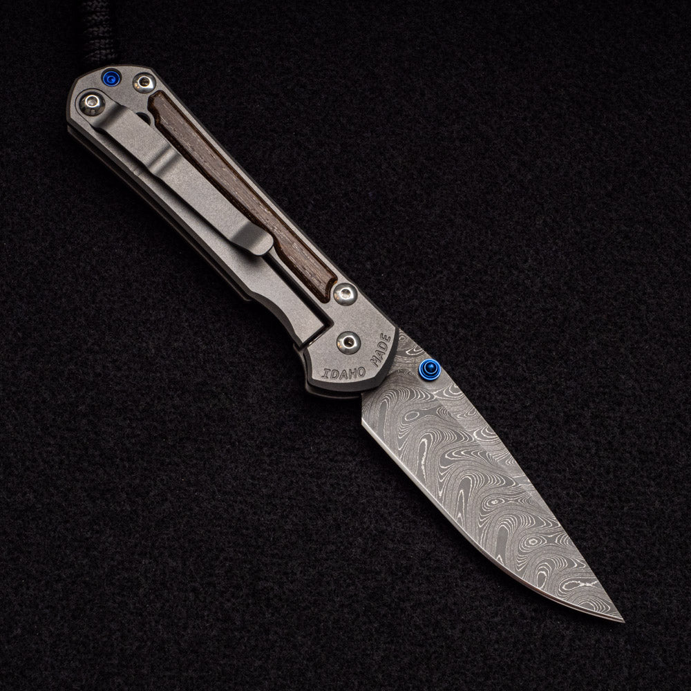 CHRIS REEVE SMALL SEBENZA 31 BOG OAK INLAY - BOOMERANG BLADE - BLUE DOUBLE THUMB LUGS