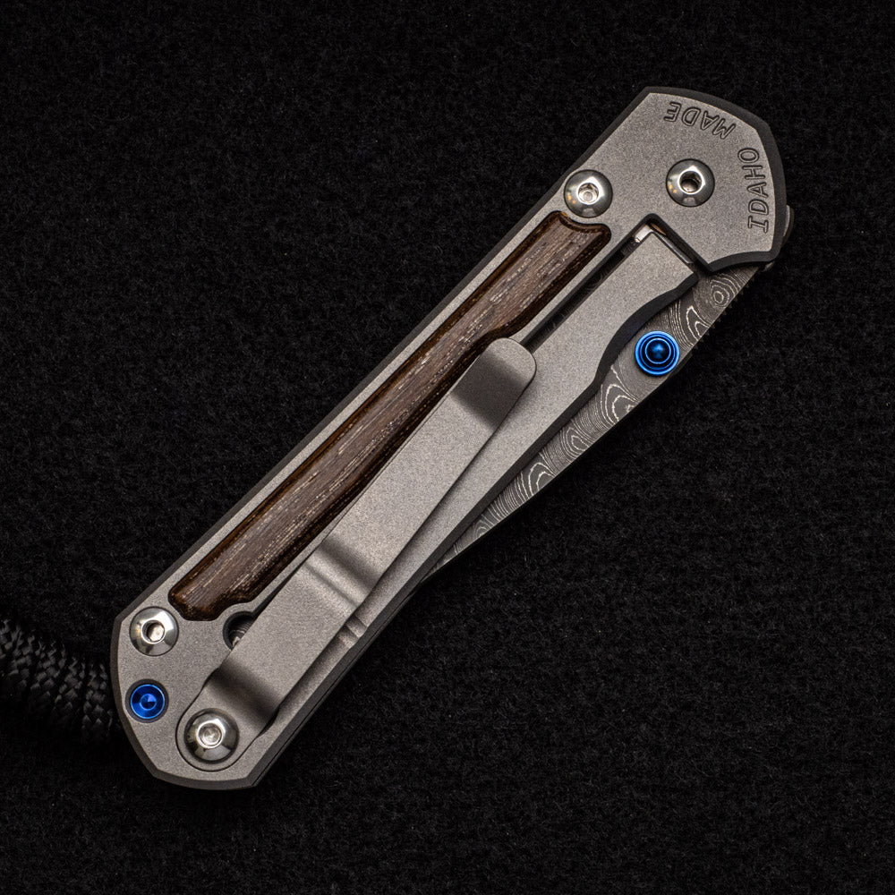 CHRIS REEVE SMALL SEBENZA 31 BOG OAK INLAY - BOOMERANG BLADE - BLUE DOUBLE THUMB LUGS