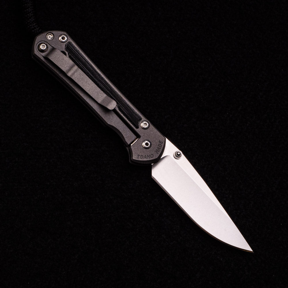 CHRIS REEVE SMALL SEBENZA 31 BLACK CANVAS MICARTA INLAY – CPM MAGNACUT BLADE – SILVER DOUBLE THUMB LUGS