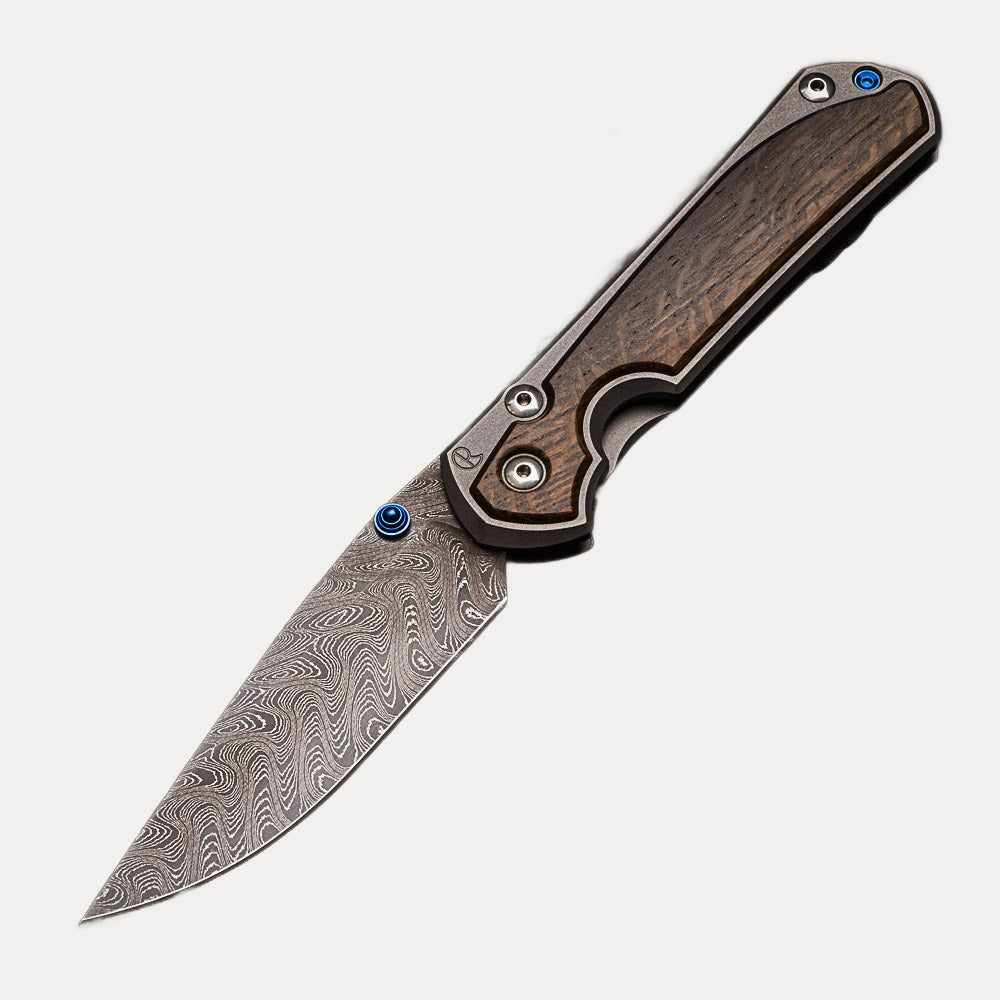 CHRIS REEVE LARGE SEBENZA 31 BOG OAK - BOOMERANG BLADE - BLUE DOUBLE THUMB LUGS