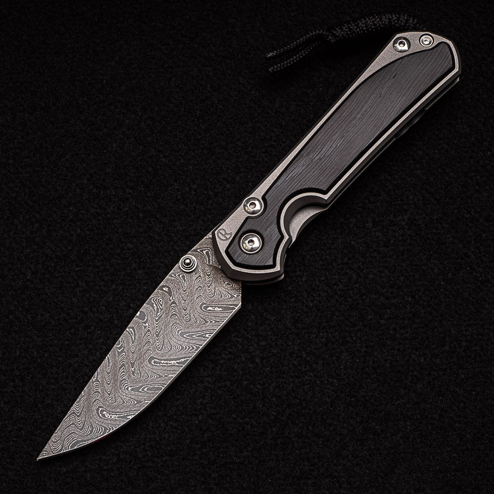 CHRIS REEVE LARGE SEBENZA 31 BOG OAK - BOOMERANG BLADE - SILVER DOUBLE THUMB LUGS