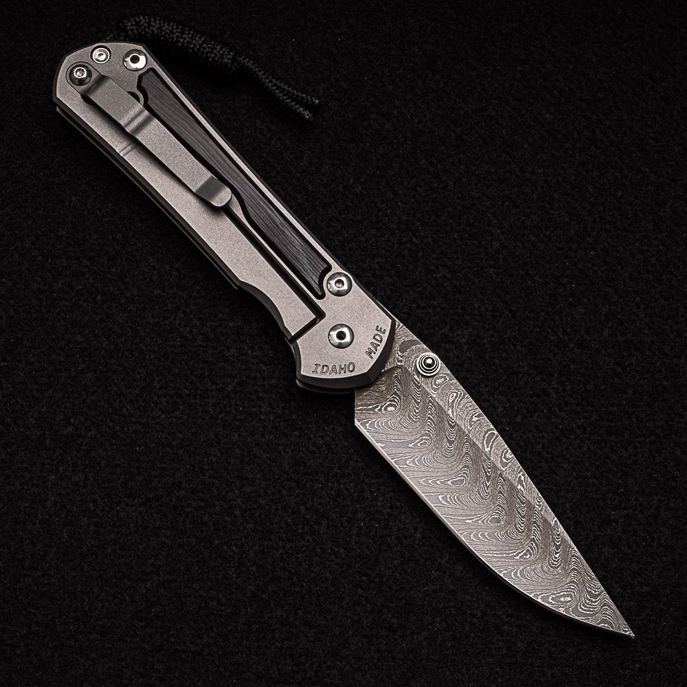 CHRIS REEVE LARGE SEBENZA 31 BOG OAK - BOOMERANG BLADE - SILVER DOUBLE THUMB LUGS