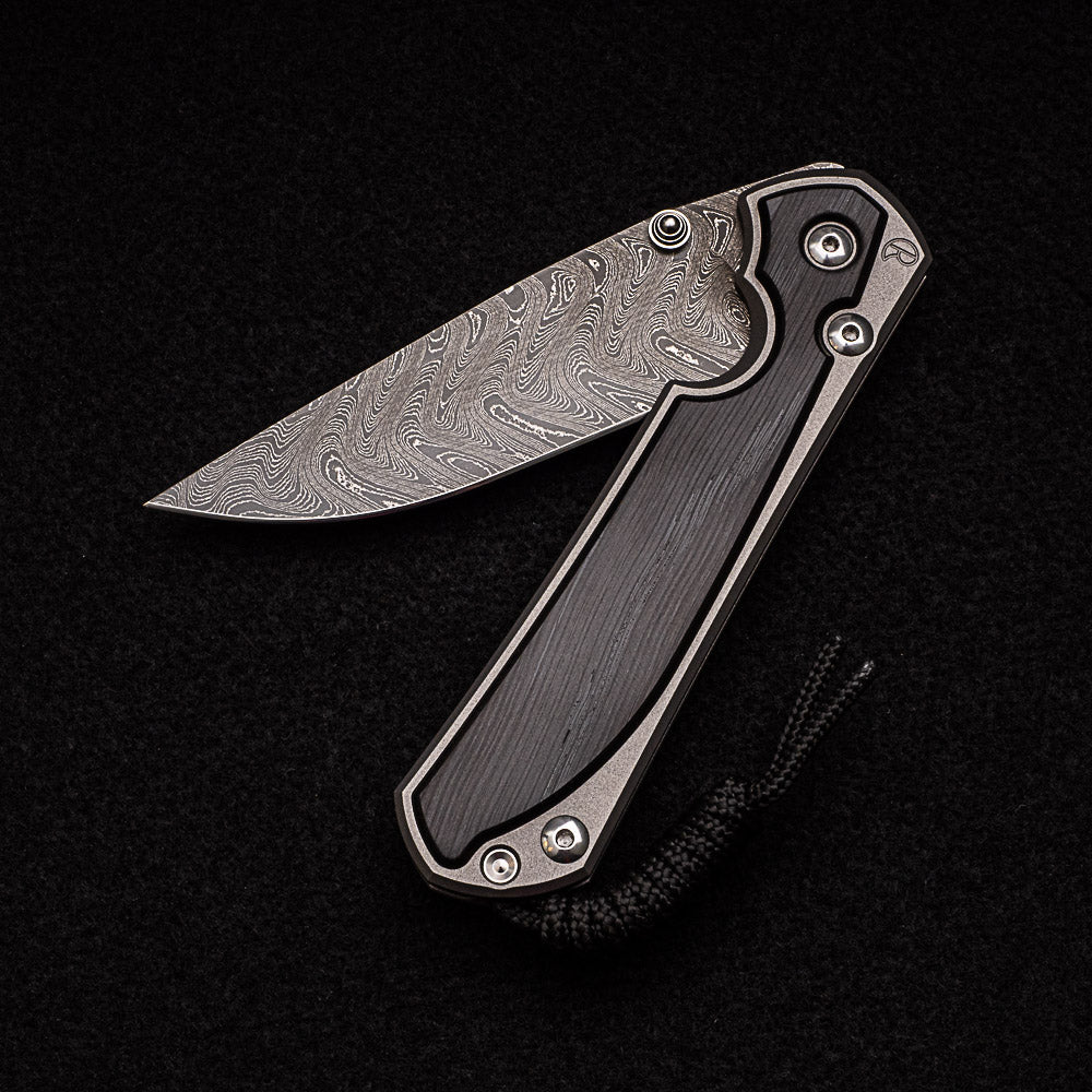 CHRIS REEVE LARGE SEBENZA 31 BOG OAK - BOOMERANG BLADE - SILVER DOUBLE THUMB LUGS