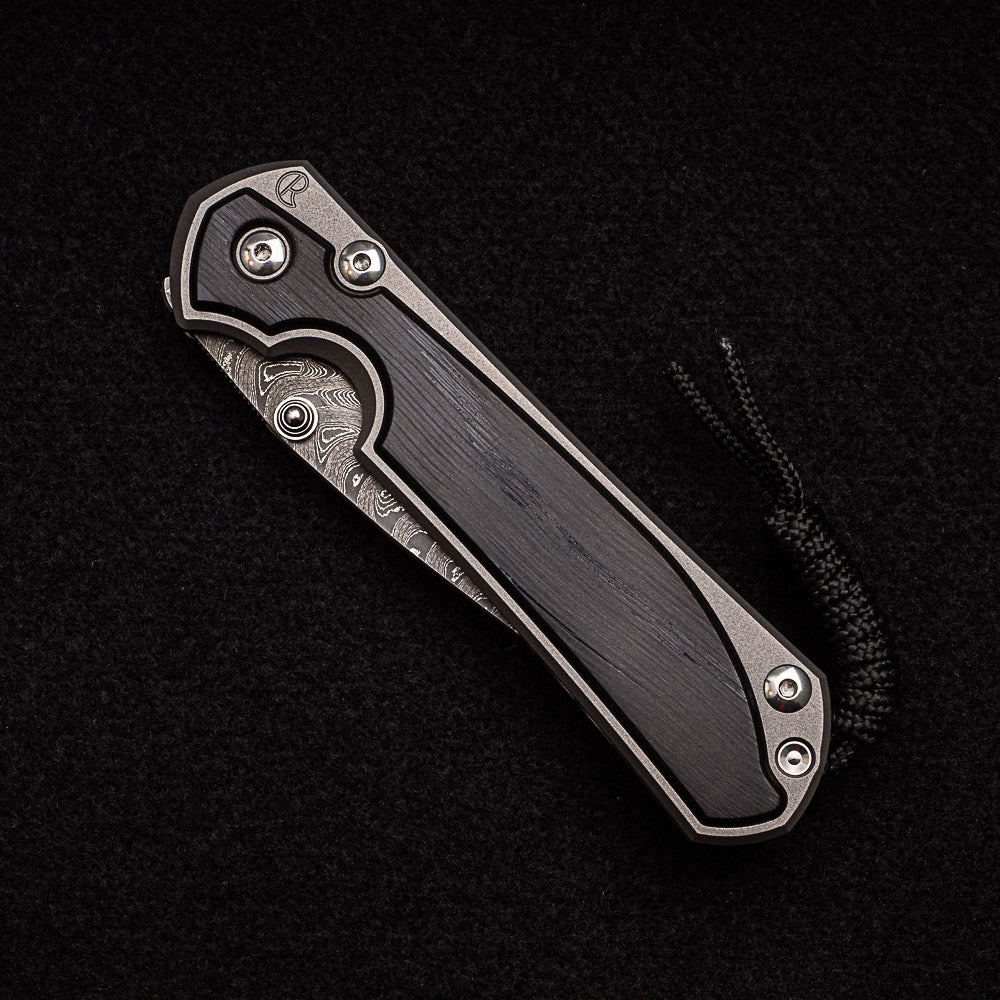 CHRIS REEVE LARGE SEBENZA 31 BOG OAK - BOOMERANG BLADE - SILVER DOUBLE THUMB LUGS