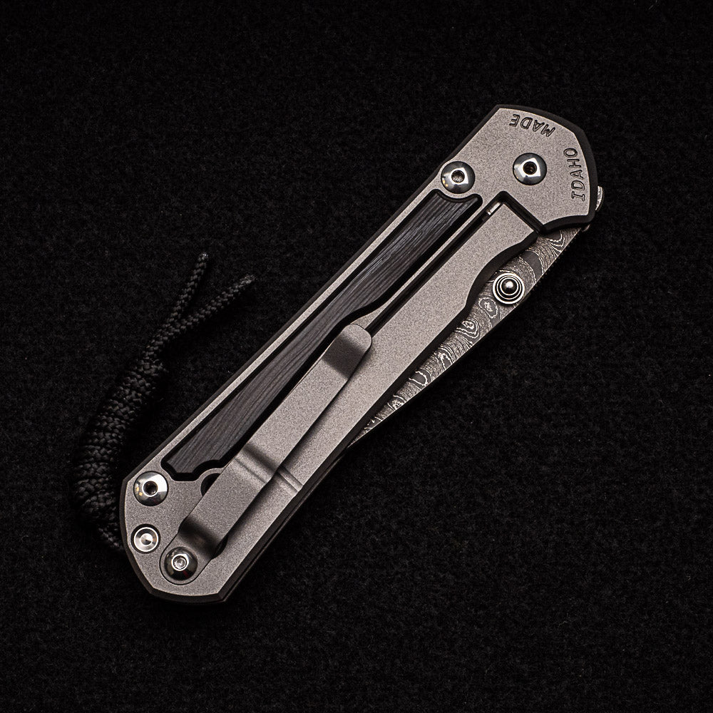 CHRIS REEVE LARGE SEBENZA 31 BOG OAK - BOOMERANG BLADE - SILVER DOUBLE THUMB LUGS