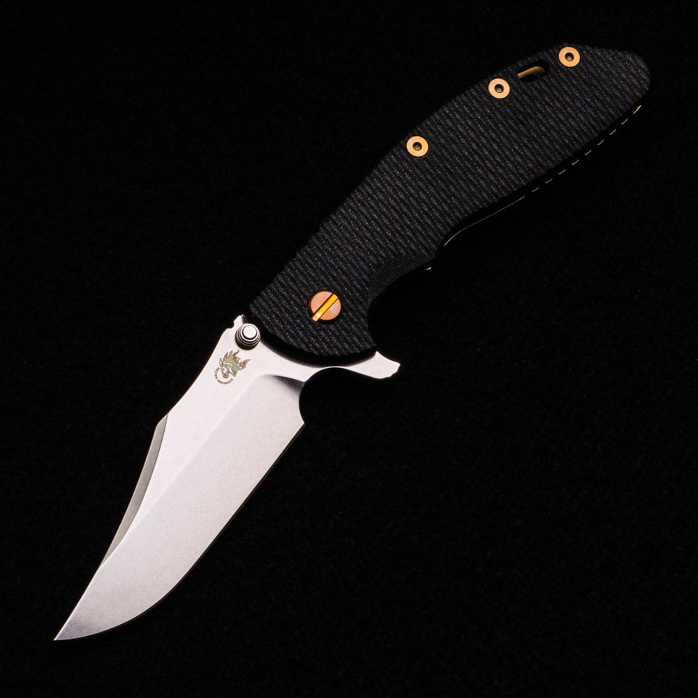 Hinderer Knives XM-24 4.0″ – Bowie CPM 20CV Blade – Tri-Way – Stonewash Bronze – Black G10