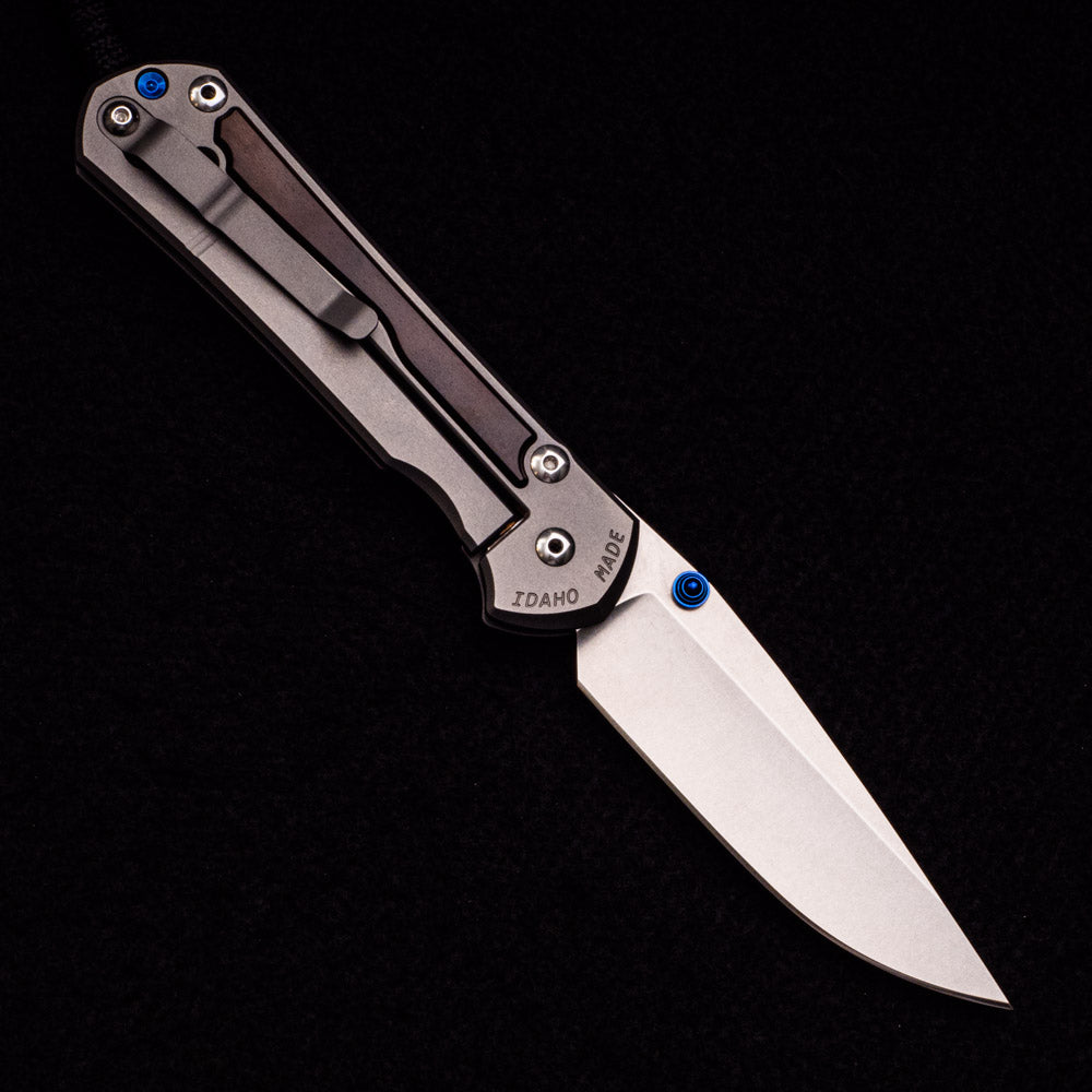 CHRIS REEVE LARGE SEBENZA 31 MACASSAR INLAY – CPM MAGNACUT BLADE – BLUE DOUBLE THUMB LUGS