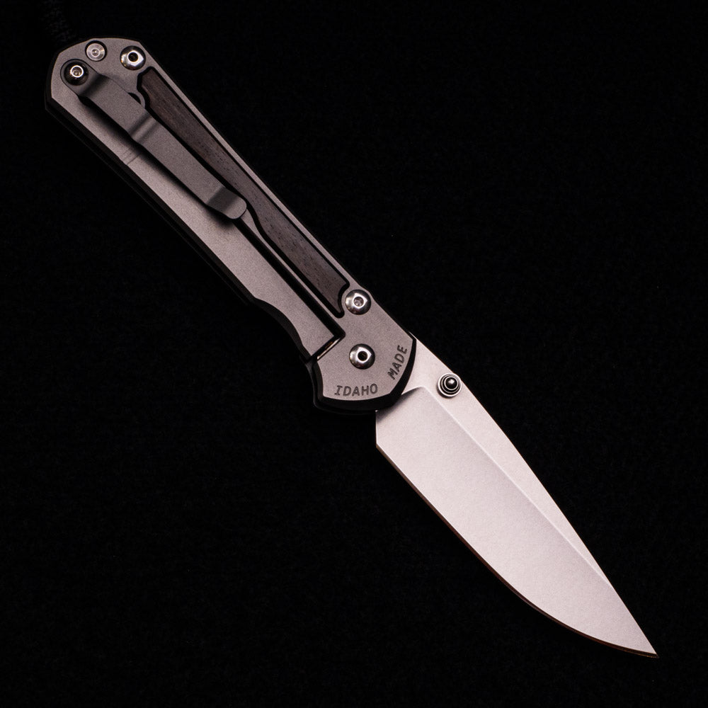 CHRIS REEVE LARGE SEBENZA 31 MACASSAR INLAY – CPM MAGNACUT BLADE – SILVER DOUBLE THUMB LUGS