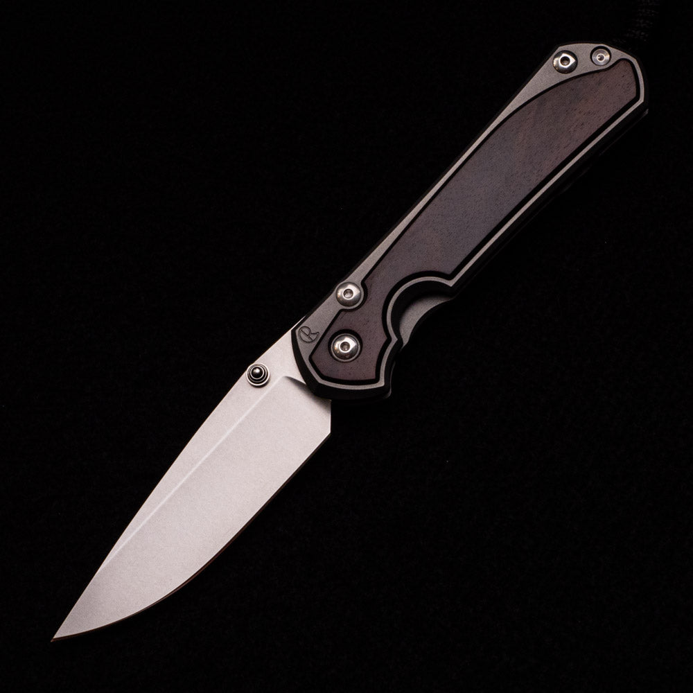 CHRIS REEVE LARGE SEBENZA 31 MACASSAR INLAY – CPM MAGNACUT BLADE – SILVER DOUBLE THUMB LUGS