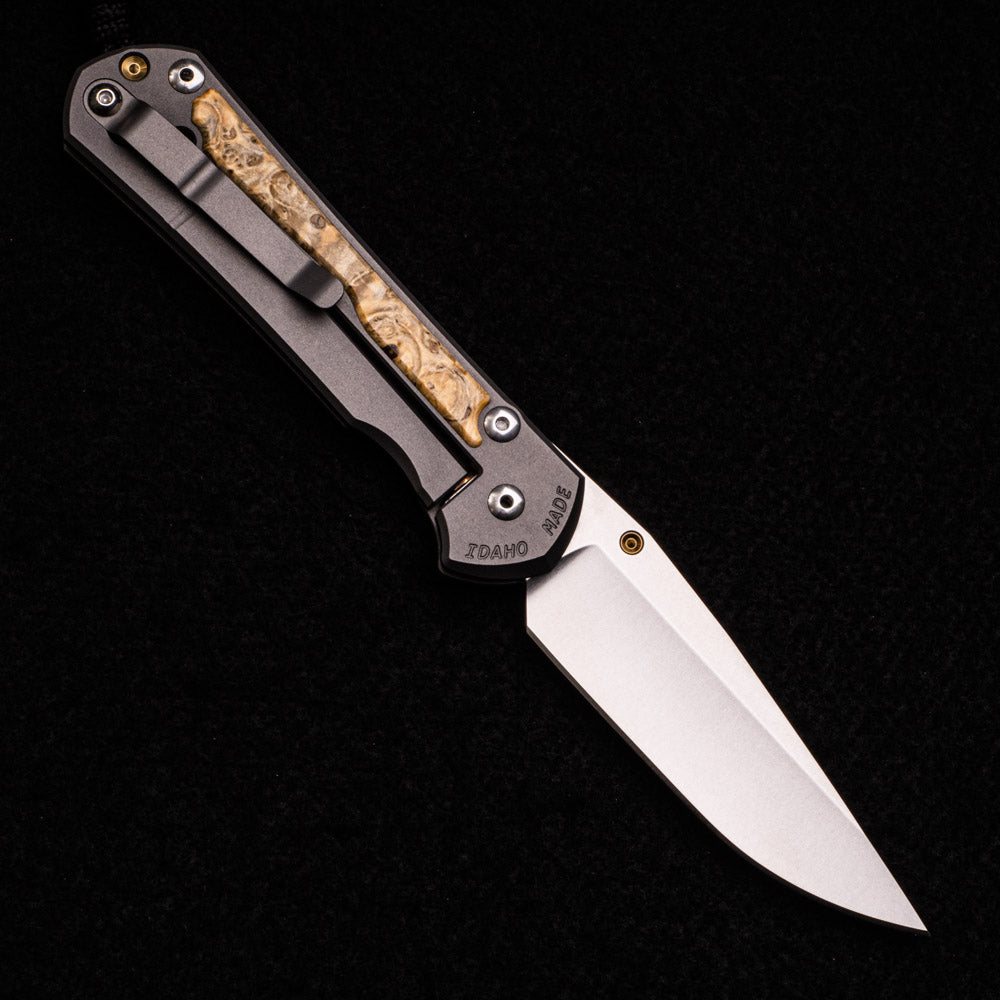 CHRIS REEVE LARGE SEBENZA 31 BOX ELDER BURL INLAY – CPM MAGNACUT BLADE – GOLD DOUBLE THUMB LUGS